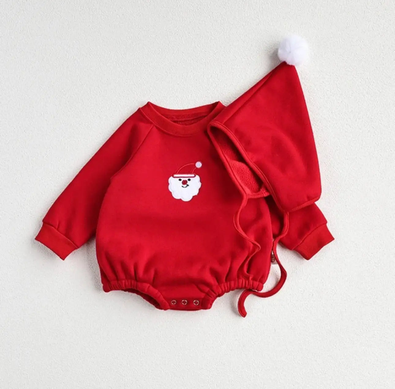 Baby crawling in beige reindeer antler romper – cute and cozy Christmas outfit in Canada and USA