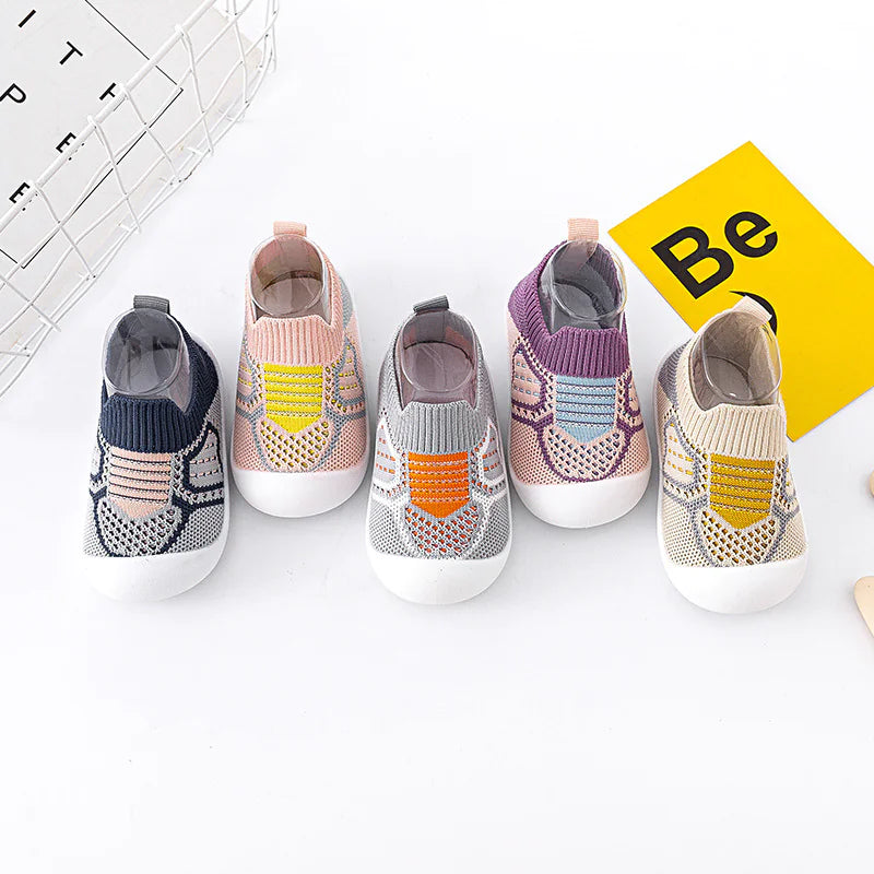 Infant StepSecure Flexible Shoes with non-slip soles, lightweight design, and comfortable fit, ideal for supporting first steps and healthy foot development for boys and girls.