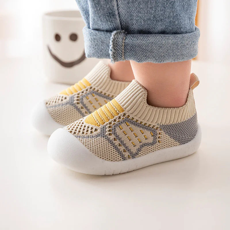 Infant StepSecure Flexible Shoes with non-slip soles, lightweight design, and comfortable fit, ideal for supporting first steps and healthy foot development for boys and girls.