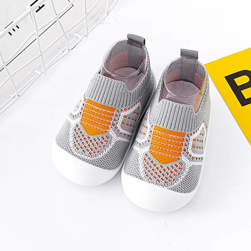 Infant StepSecure Flexible Shoes with non-slip soles, lightweight design, and comfortable fit, ideal for supporting first steps and healthy foot development for boys and girls.